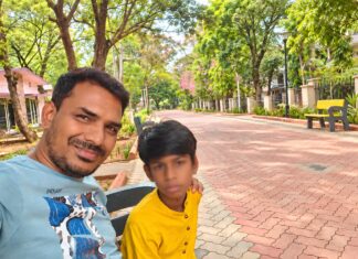 Part 7: Supporting Yourself While Raising an Autistic Child Parent spending a quiet moment outdoors with their autistic child during an everyday family outing.